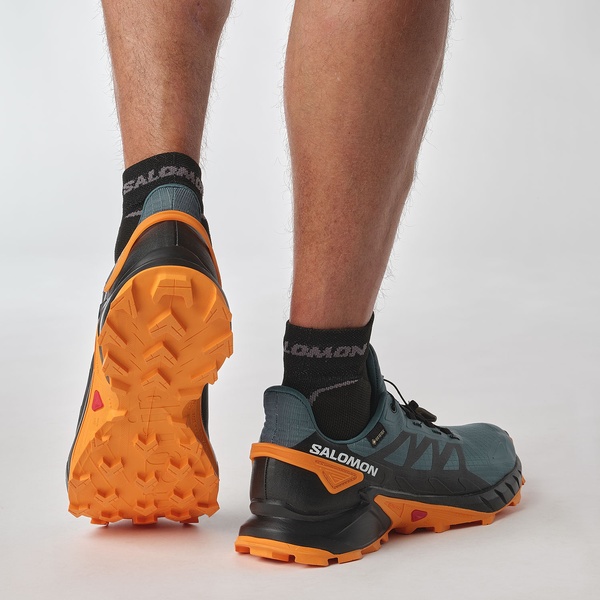 Trailové běžecké boty Salomon Supercross 4 GTX Gore-tex M L47119800 Stargazer Black Turmeric 25/26